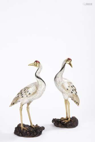 A pair of Chinese gilt and enamel cranes