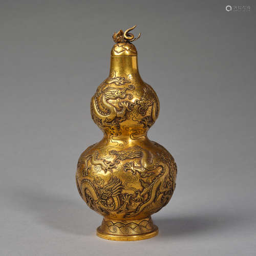 A Gilded copper gourd-shaped wine bottle,Qing dynasty