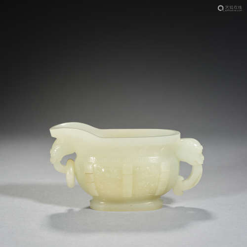 A pale celadon jade handled cup, Qing dynasty