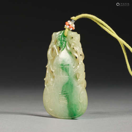 A jadeite 'gourd' plaque, Qing dynasty