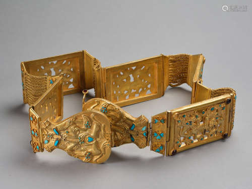 A belt of pure gold inlaid with turquoise