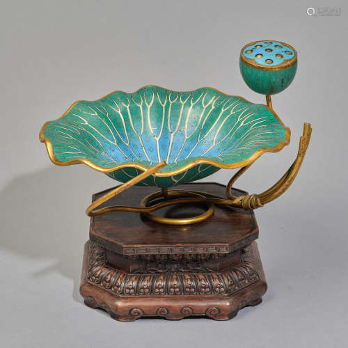 A rare  cloisonné enamel 'Lotus leaf' ornament with wood bas...