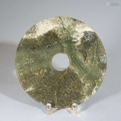 A green jade bi disc, Late Warring States period