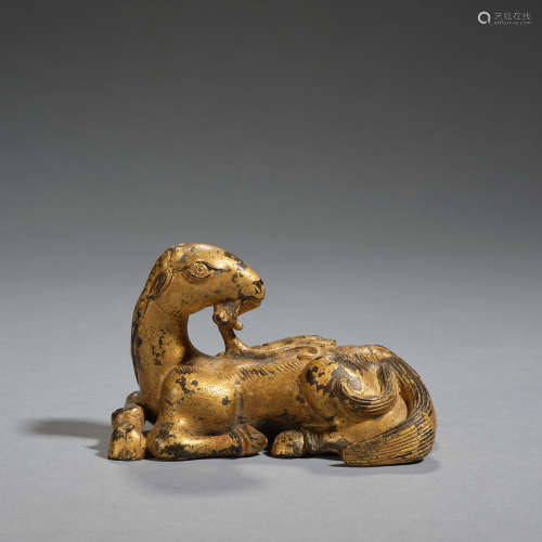 A gilt-copper alloy figure of a sheep, Nepal or Tibet