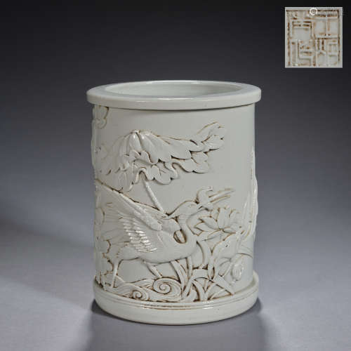 A carved white biscuit porcelain brushpot,Qing dynasty