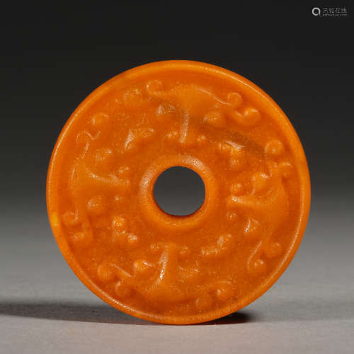An round amber pendant