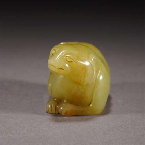 A CHINESE YELLOW JADE CARVING OF MYTHICAL BEAST