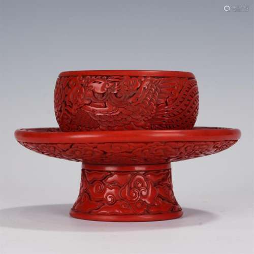 A CHINESE CARVED CINNABAR LACQUER CUP WITH SAUCER