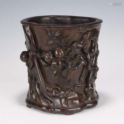 A CHINESE HARDWOOD CARVED BRUSH POT
