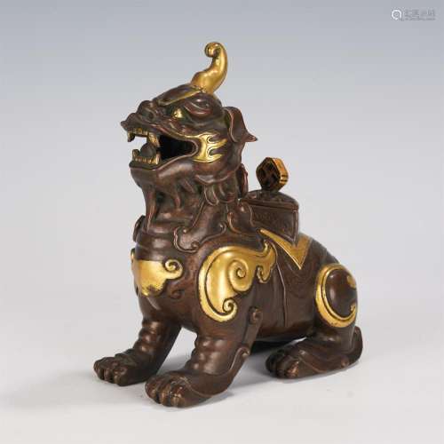 A CHINESE PARTLY GILT BRONZE BEAST FORM INCENSE BURNER