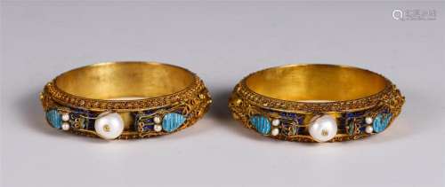 A PAIR OF CHINESE GILT BRONZE DOUBLE DRAGON PEARL BRACELETS