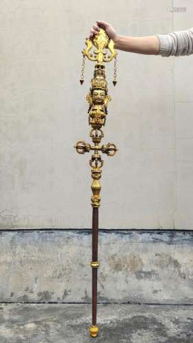 A CHINESE GILT BRONZE STAVES