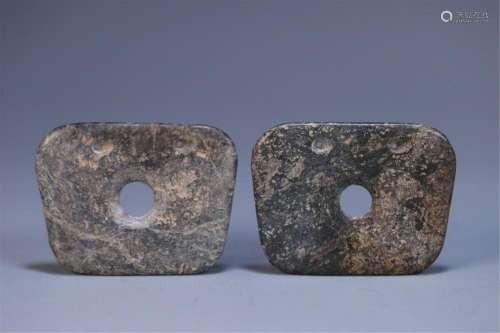 A PAIR OF CHINESE JADE BI DECORATIONS