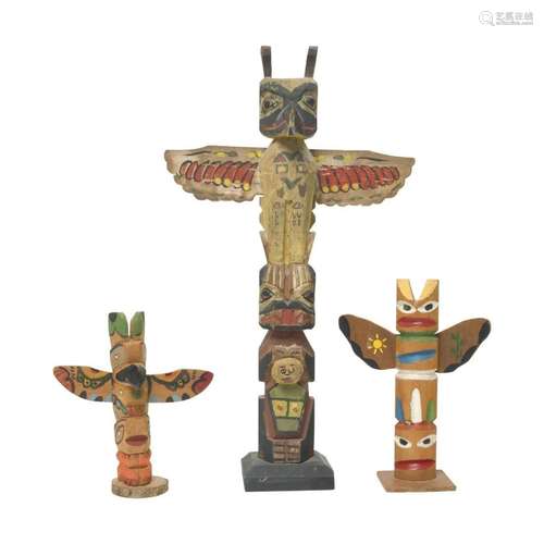 Three Pacific Northwest Totems Including Alas Rau