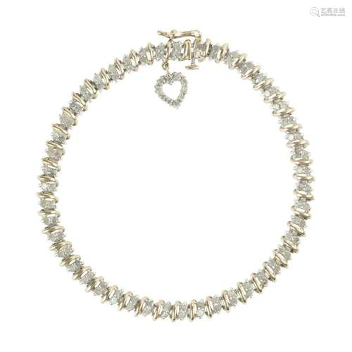 Diamond, 10k Yellow Gold Bracelet.