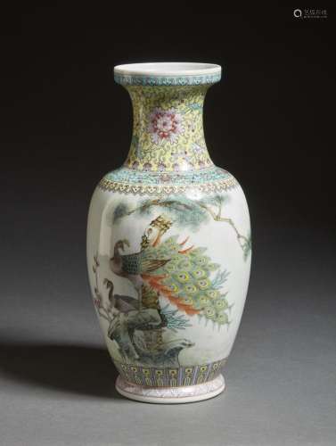 Chinese Art A porcelain vase decorated with peacock and insc...