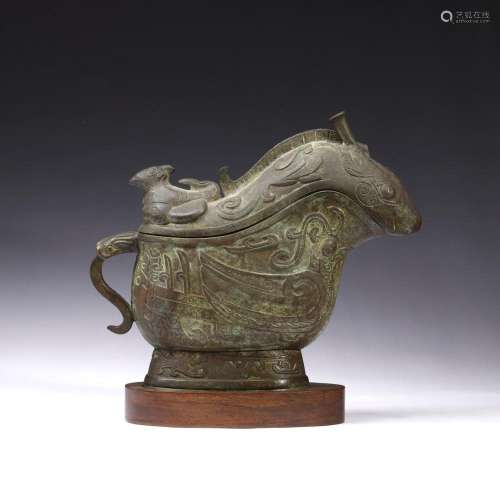 Chinese Art A archaic style zoomorphic bronze vase and cover...