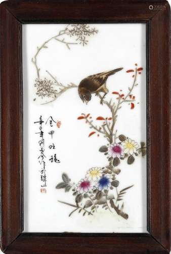 Chinese Art A porcelain plaque painted with a bird on a blos...