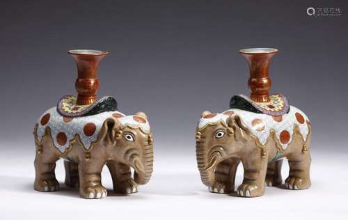 Chinese Art A pair of elephant shaped pottery candlesticks b...