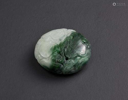 Chinese Art A jadeite pendant. China, 20th century.