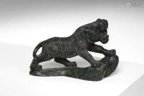 Japanese Art A carved marble tiger figure in the Japanese st...