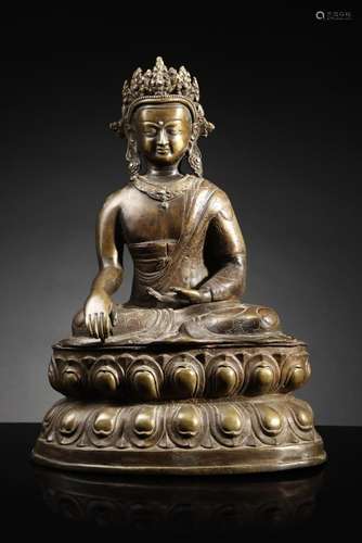 Himalayan Art A large bronze figure of crowned Buddha Tibet,...