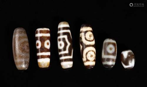 Himalayan Art A group of five agate dzi