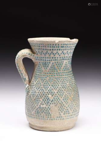 Islamic Art A pottery coffee pot with abstract turquoise dec...