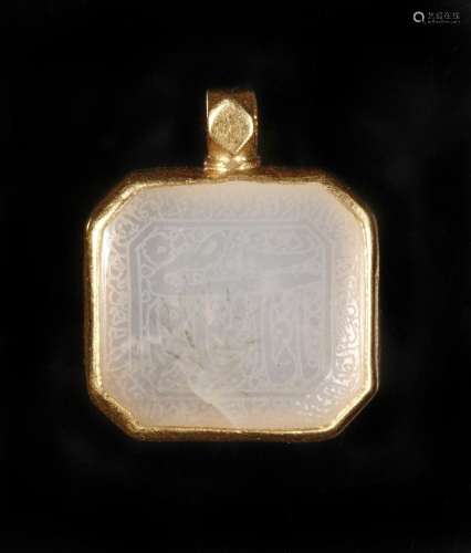 Indian Art A jade pendant (haldili) within gold frame India,...
