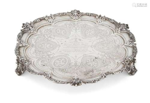 A VICTORIAN SILVER SALVER DECORATED WITH MASKS OF BACCHUS AN...