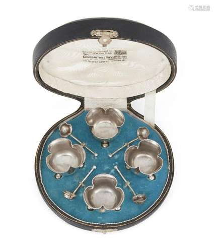 A CASED SET OF VICTORIAN SILVER TREFOIL-SHAPED SALTS, BIRMIN...