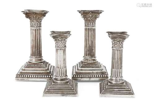 A PAIR OF VICTORIAN SILVER CORINTHIAN COLUMN CANDLESTICKS, S...