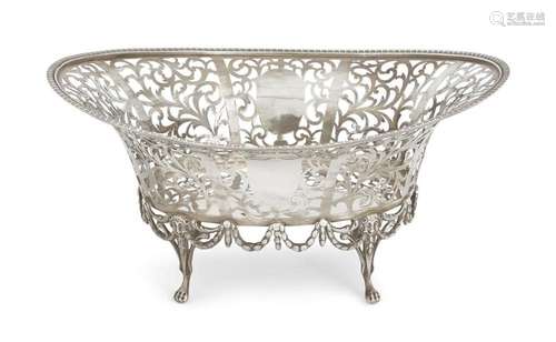 A PIERCED EDWARDIAN SILVER BREAD BASKET, LONDON, 1909, C. S....