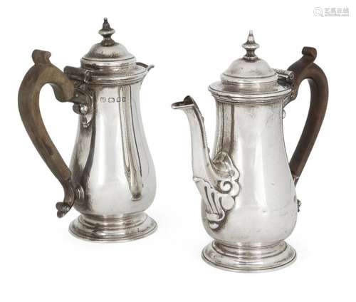 A PAIR OF SILVER CAFÉ-AU-LAIT POTS, LONDON, 1932 & 1933,...