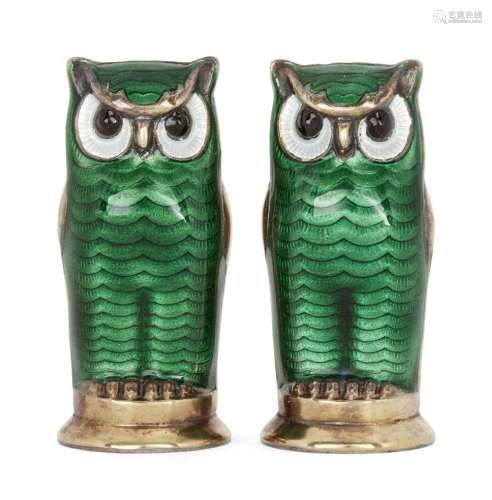A PAIR OF NORWEGIAN SILVER GILT AND GREEN ENAMEL OWL PEPPERS...