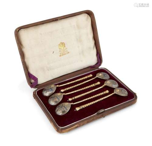 A CASED SET OF SIX RUSSIAN SILVER GILT AND NIELLO SPOONS, MO...