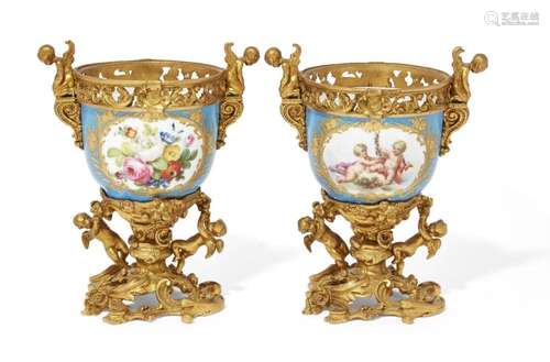 A PAIR OF SEVRES STYLE GILT-BRONZE MOUNTED PORCELAIN POTPOUR...