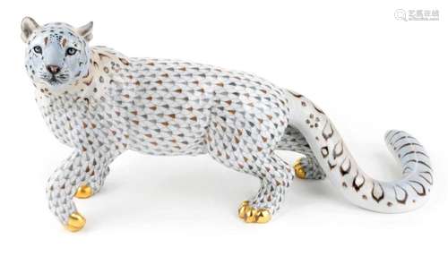 A HEREND PORCELAIN MODEL OF A SNOW LEOPARD, LATE 20TH CENTUR...