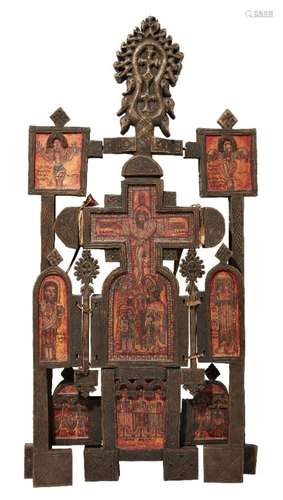 AN ETHIOPIAN CARVED AND PAINTED WOOD DEVOTIONAL ICON OR ALTA...