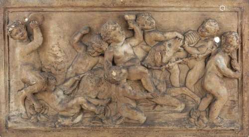 A FRENCH PLASTER RELIEF PLAQUE OF A BACCHANALIAN SCENE, IN T...