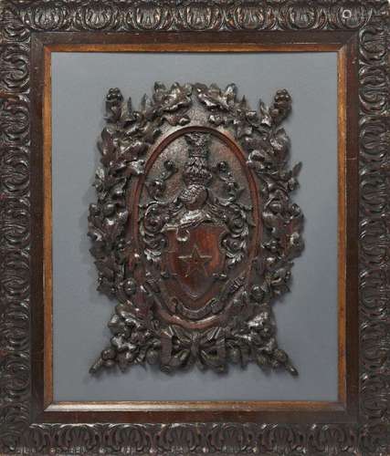 A VICTORIAN OAK RELIEF FAMILY CREST FOR ASSHETON, SECOND HAL...