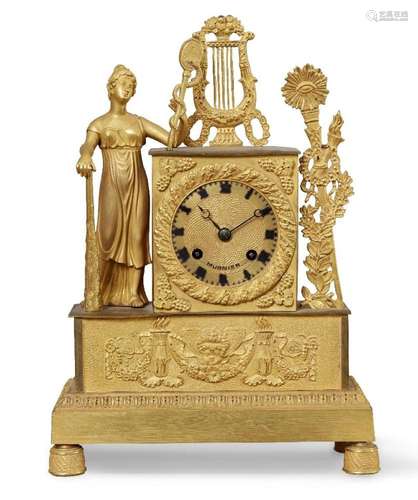 A CHARLES X ORMOLU MANTEL CLOCK, THE CASE WITHSTANDING GREEK...