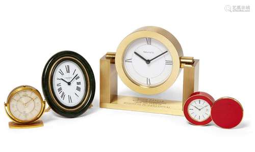 A MODERN CARTIER TRAVEL ALARM CLOCK, WITH SIGNED OVAL WHITE ...