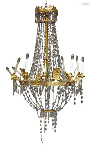 A FRENCH GILT-BRONZE AND CUT-GLASS DROP TEN-LIGHT CHANDELIER...