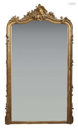 A FRENCH GILTWOOD OVERMANTEL MIRROR, WITH SHAPED TOP PLATE B...