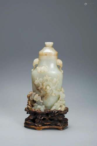 A WHITE AND BROWN JADE VASE AND LID QING DYNASTY