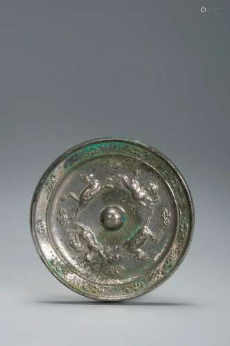 A SILVERY BRONZE CIRCULAR MIRROR TANG DYNASTY