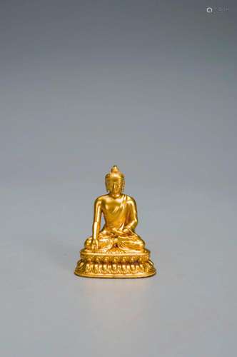 A GILT-BRONZE FIGURE OF SEATED BUDDHA QING DYNASTY, QIANLONG...