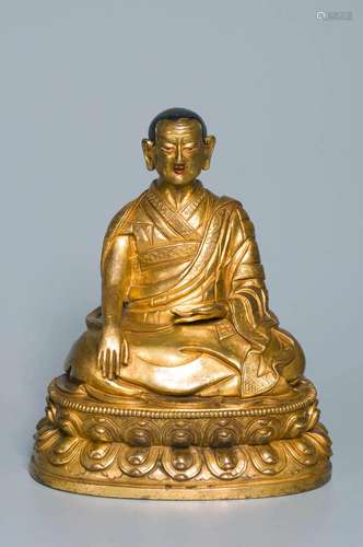 A GILT-COPPER FIGURE OF GURU QING DYNASTY