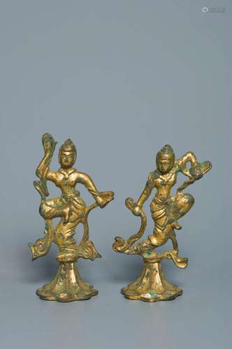 A PAIR OF GILT-BRONZE FIGURES OF APSARA TANG DYNASTY